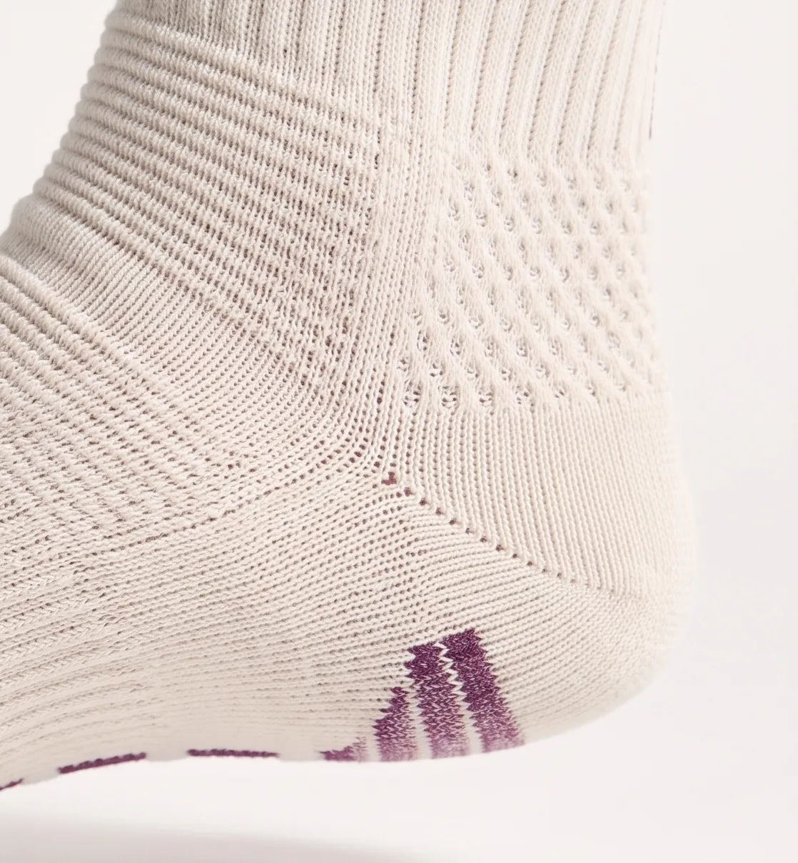 Padded heel with marled stripe ends curling up the back