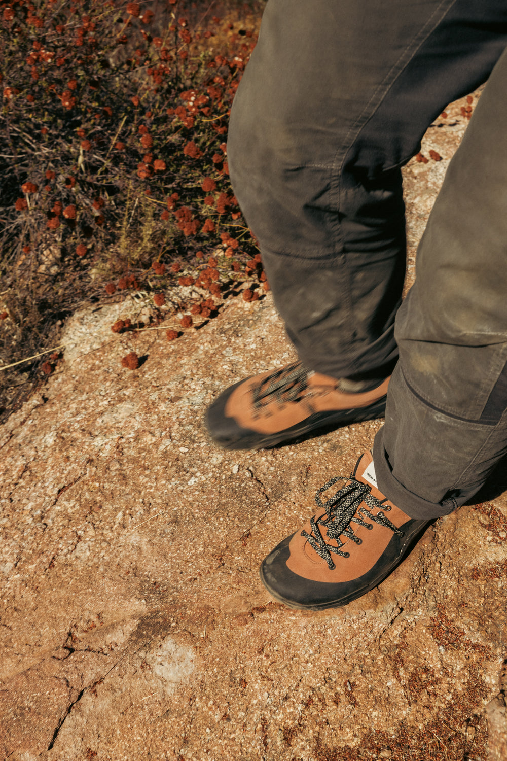 LONO WILD shoes moving across rocky outdoor terrain