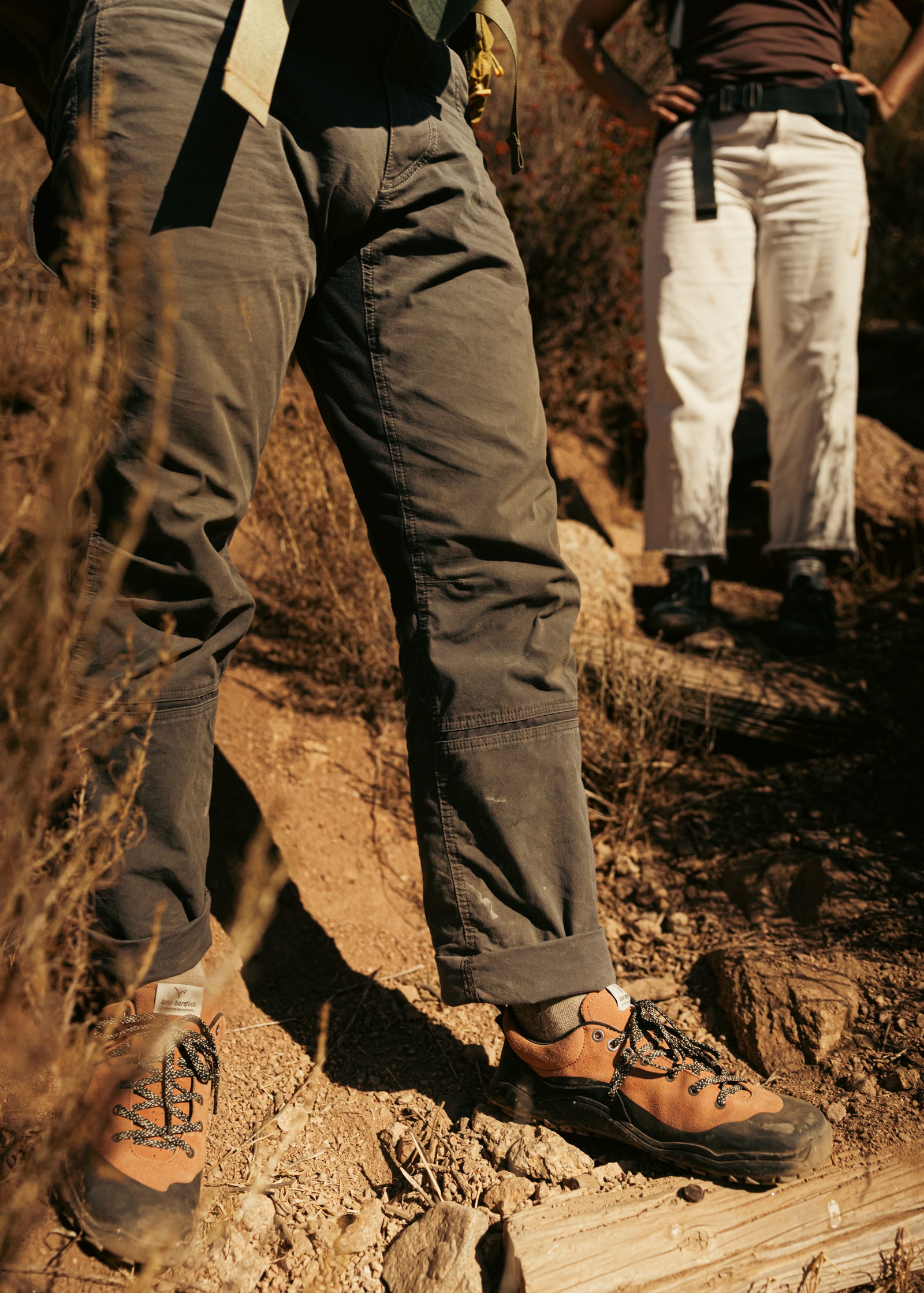 LONO WILD shoes walking through rocky trail terrain
